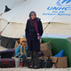 Newly arrived refugees from Syria wait for tents to go up at the Za’atari refugee camp on January 30, 2013 in Mafraq, Jordan.